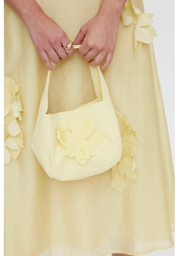Bolso de mano amarillo claro