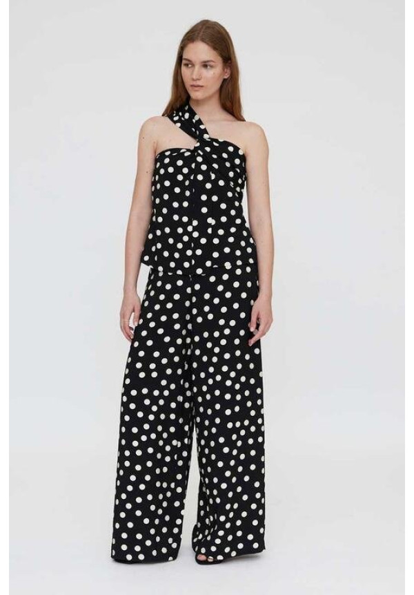 Top asimétrico con estampado de puntos negro y blanco